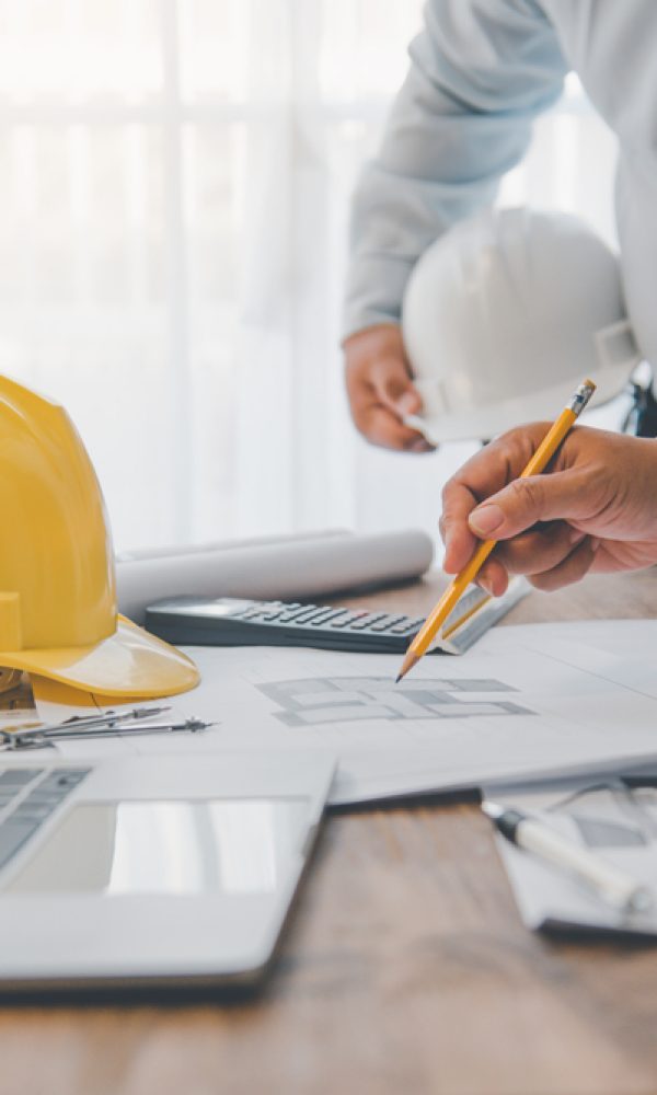 Engineer,Working,In,Office,With,Blueprints,,Inspection,In,Workplace,For